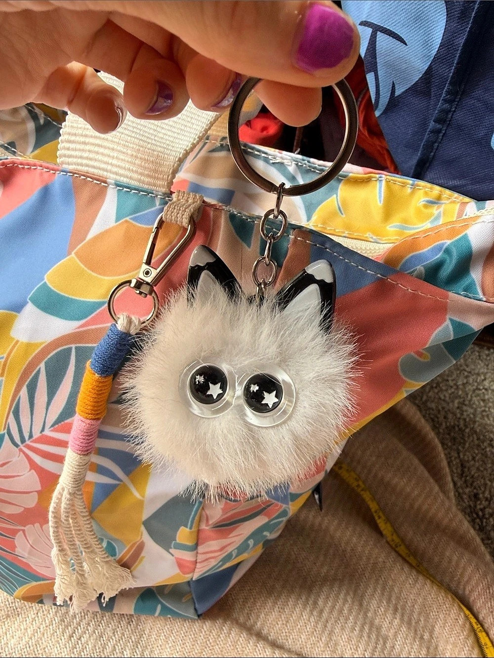 White star eyed cat puff puff keychain with tail